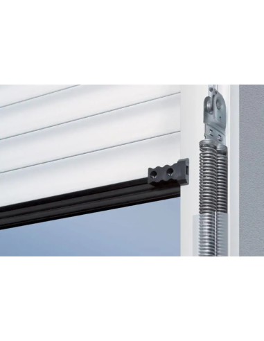Technique à ressorts de traction brevetée avec système de ressorts doubles dans la porte de garage
enroulable RollMatic